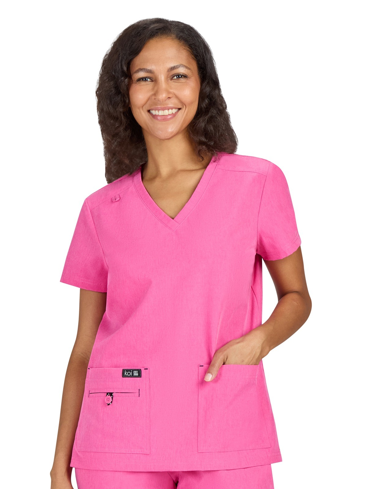 koi Basics Becca scrub top with front pockets, classic v-neck and light-weight fabric with two-way stretch