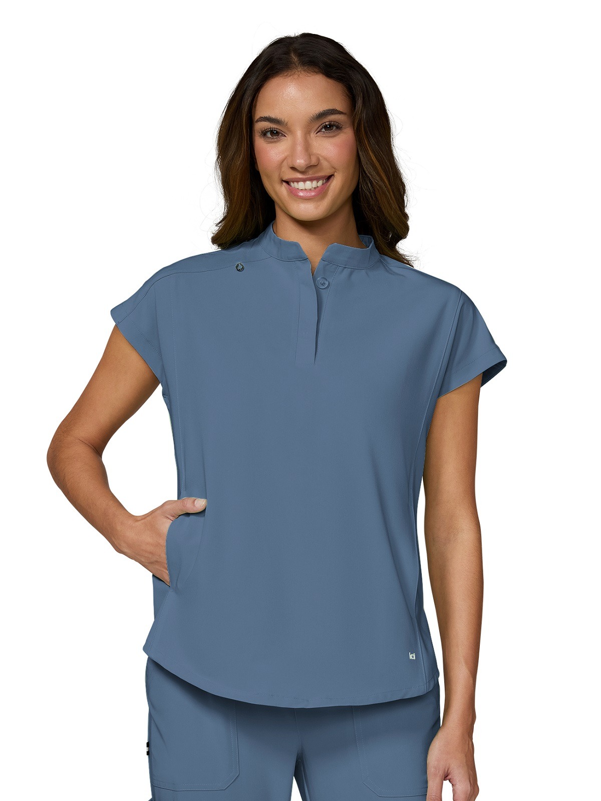 Ladies koi scrubs top with high neck collar and a hidden button closure plus dolman cap sleeves